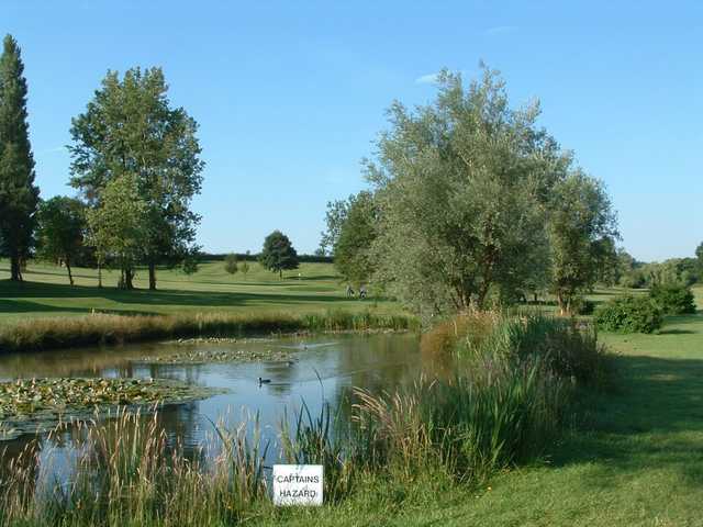 The 7th hole at Kettering as seen from the edge of the water hazard