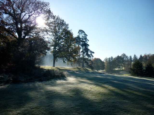 A view of the morning sun rising over Sweetwoods Park GC