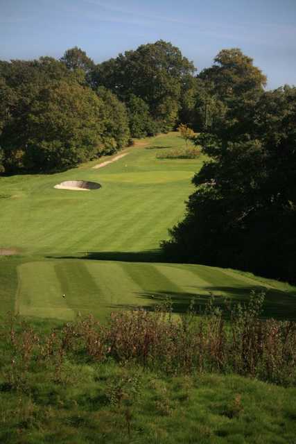 The uphill 7th at Sweetwoods with greenside protective bunker