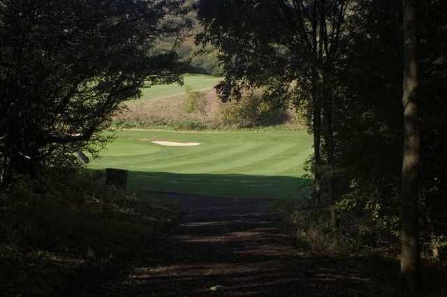 Greenside bunkers protect the approach to the pin at Willingdon