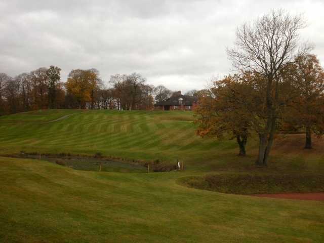 The sloping fairways, water hazard and bunkers make a great test for shot placement