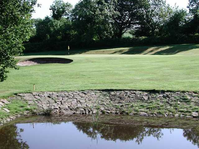 A view of the green from the water hazard