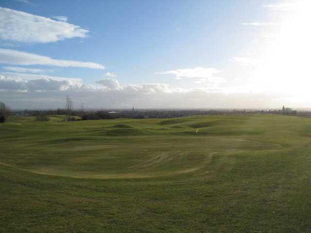 The sun shining over the 9th green at Hart Common Golf Club