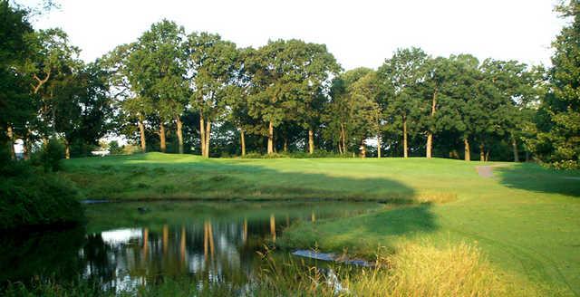 A view of green surrounded by water at Clearview Park Golf Course