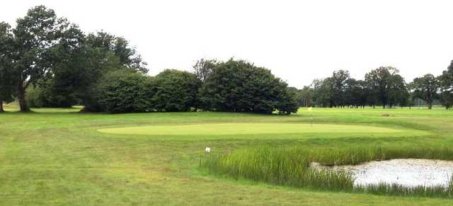 The well kept greens of Ferndown Forest Golf Club