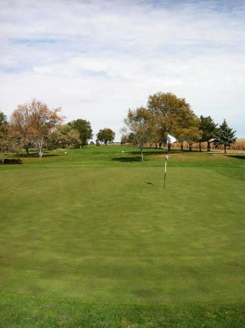 View of a green and fairway at Cozad Country Club