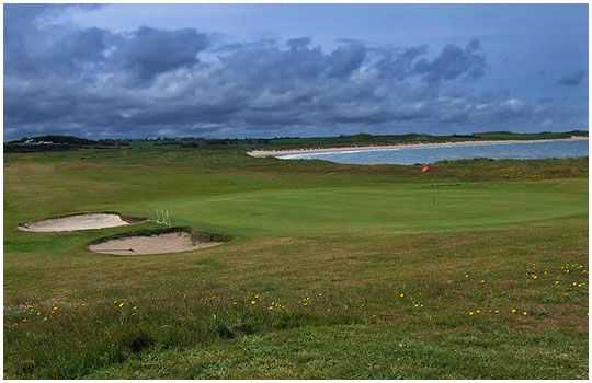 A greenside view of the coast on the Dunstanburgh Castle Golf Course