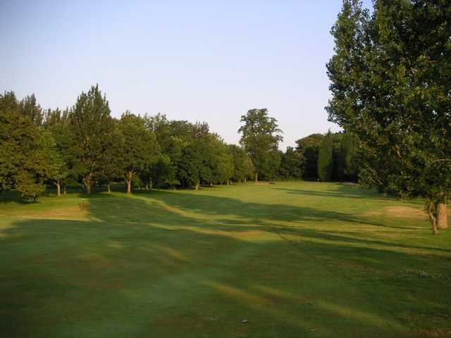 The tree lined approach to the 4th hole at Woolton Golf Club
