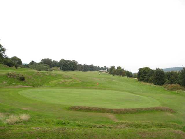 Views of the 17th green and 18th hole at St Deiniol Golf Course