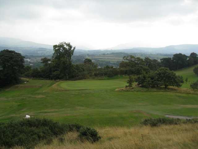 The view of the 16th green and surrounding countryside at St Deiniol Golf Course