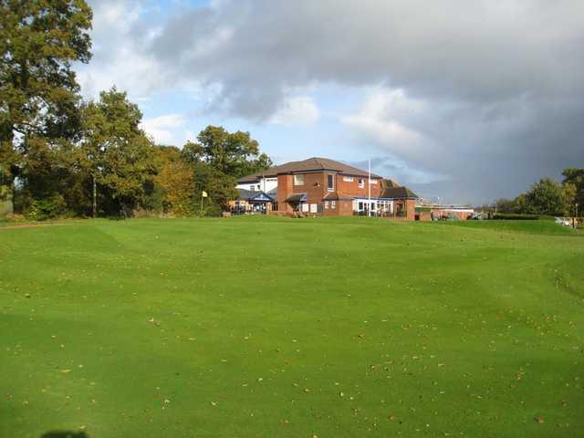 View of the 18th green and clubhouse at  Penn Golf Club