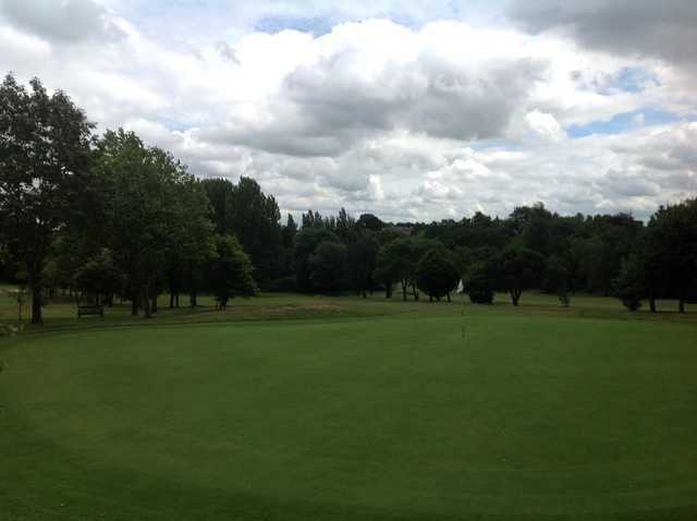 A view of the 9th green at  Cocks Moors Woods Golf Club
