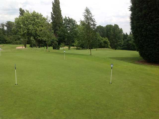 The putting green at Cocks Moors Woods Golf Club