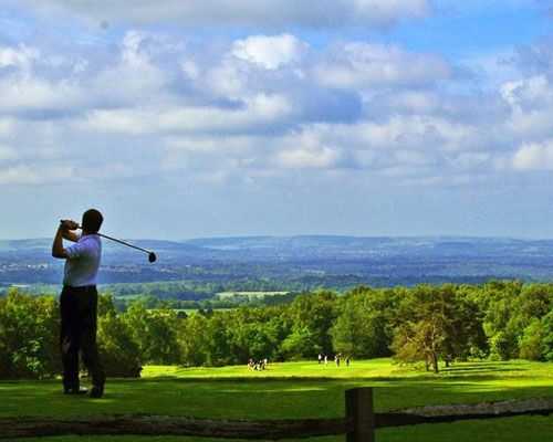 Golfer teeing at Crowborough Beacon Golf Club