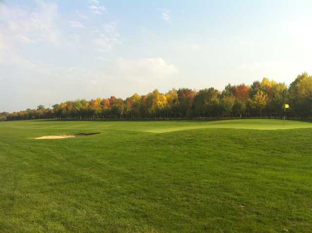 Image of lush fairway and green at Waterstock Golf Club
