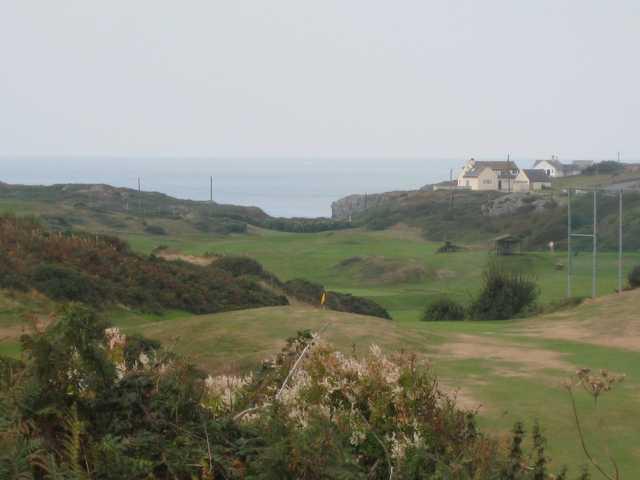 Beautiful view of the 1st hole overlooking the sea at Holyhead Golf Club