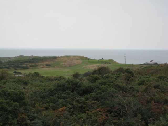 View of the 3rd green and ocean backdrop at Holyhead Golf Club