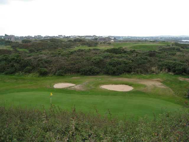 View of the 9th green and neighbouring villages at Holyhead Golf Club