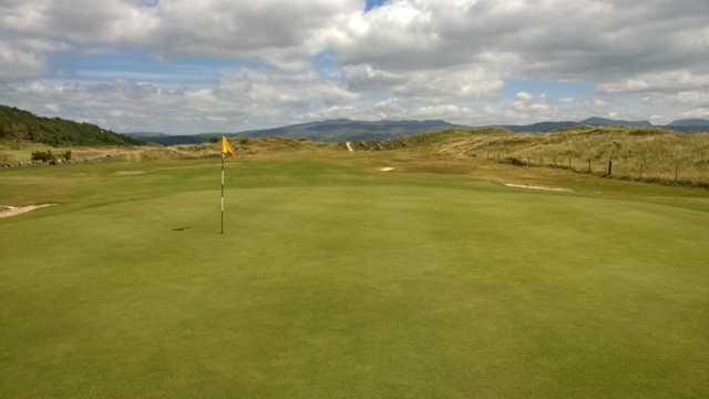 A scenic view of the 14th green at Porthmadog Golf Club