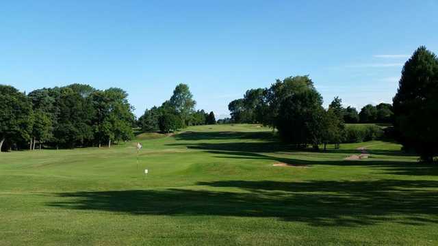 A scenic view of the 18th hole at Vicars Cross Golf Club 