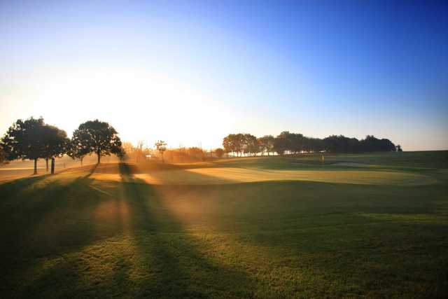 Sunrise over the perfectly manicured course at Stockley Park Golf
