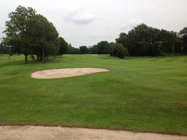 The stunning tree lined 15th fairway at Moselely Golf Club 