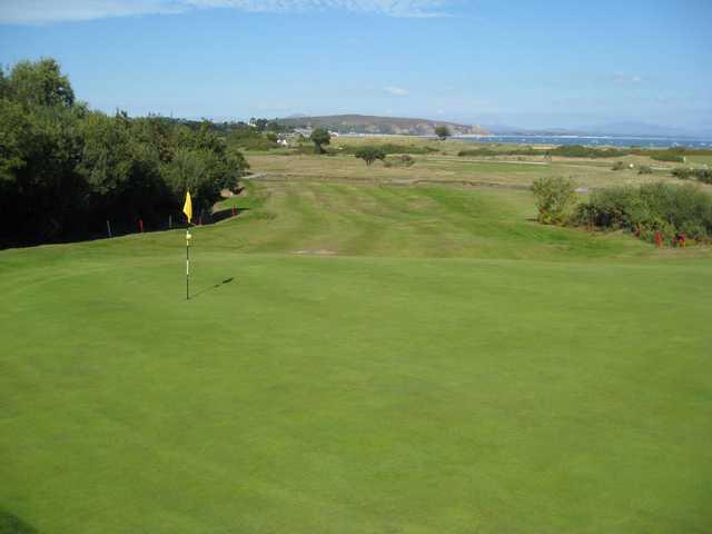 A view of the 2nd green and surrounding sea at Abersoch GC