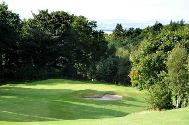 Downhill approach shot to a small green at Baberton GC