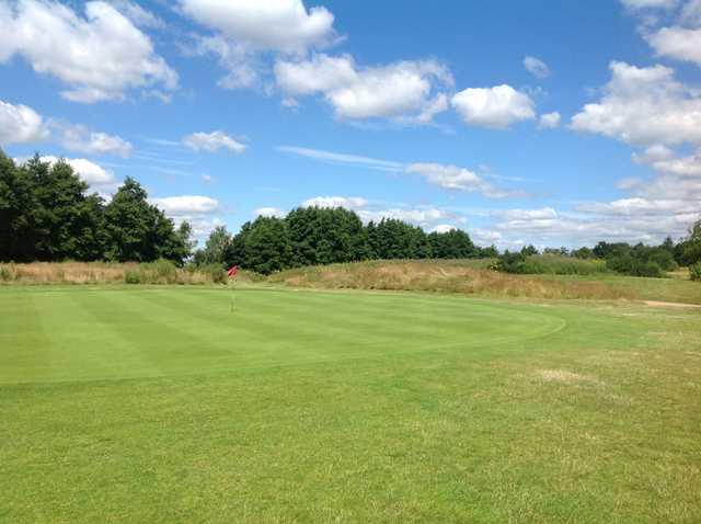 A view of the 1st green at Hurtmore Golf Club