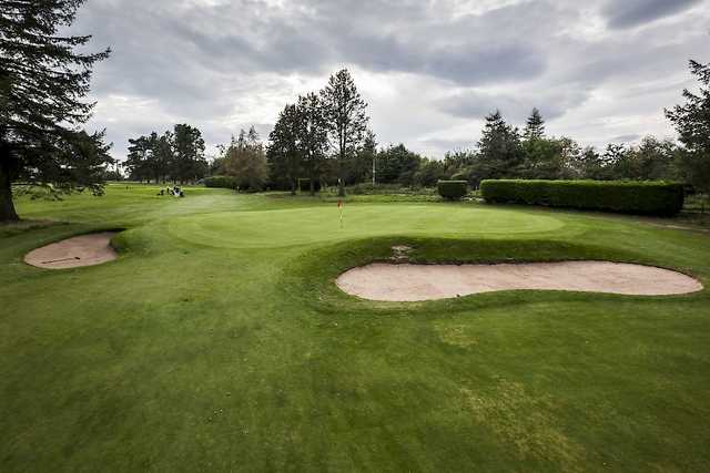 The 12th green on the Alyth Golf Course with surrounding bunkers