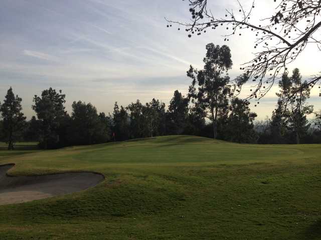 View of a green and bunker at Marshall Canyon Golf Club