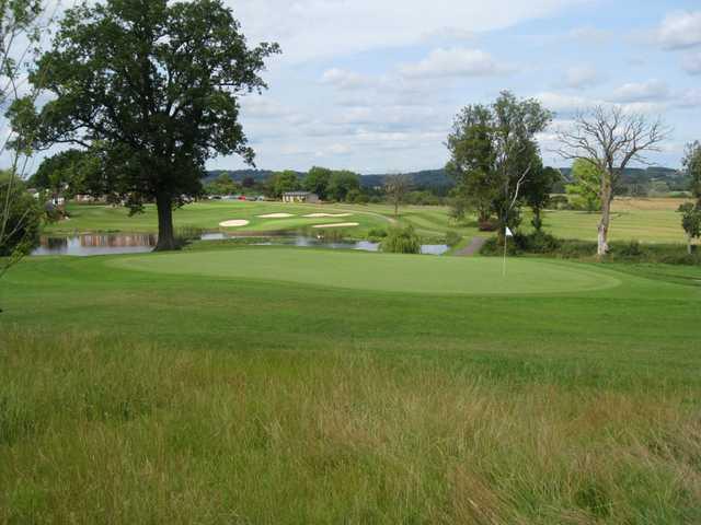Scenic views of the 17th and 18th greens and neighbouring pond at The Astbury
