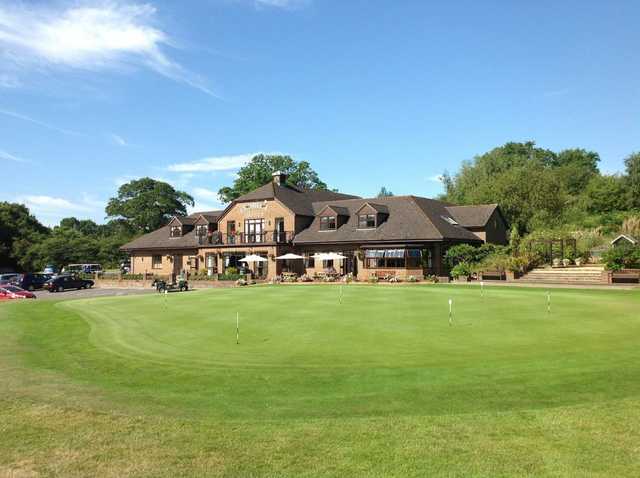 A view of the magnificent clubhouse overlooking the putting green at Chobham Golf Club