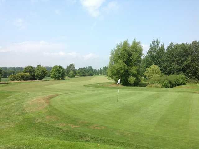A scenic view of the 18th green and fairway at Lindfield Golf Club