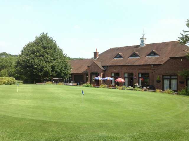 The putting green and clubhouse at Lindfield Golf Club