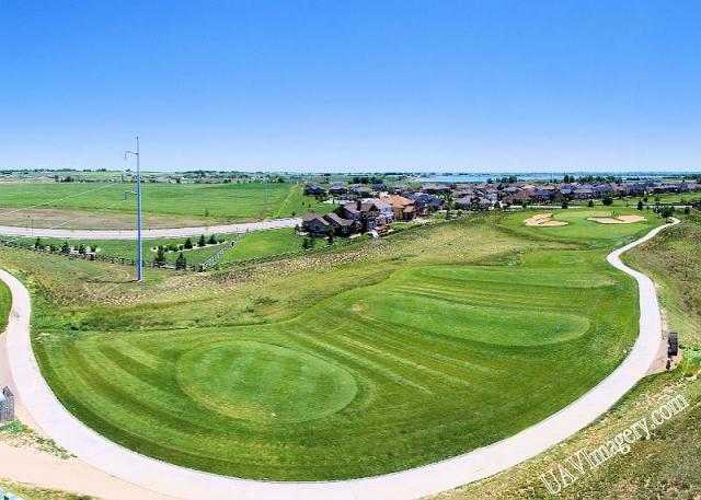 View of the par-3 6th green at Ute Creek Golf Course