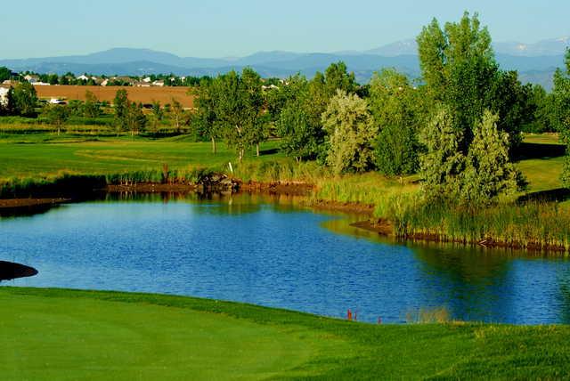 View of a green and pond at Thorncreek Golf Club