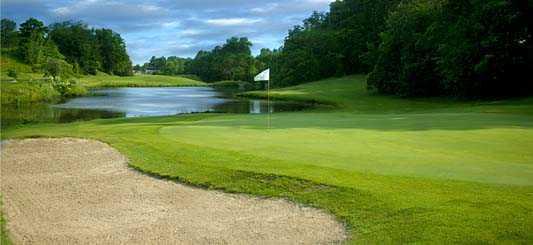 Although Indian Hills GC's 11th hole is a short par-3 of about 150yards, it's one of the most difficult holes requiring a carry over water onto the green guarded by bunkers.