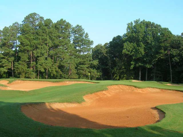 A view of the 17th green protected by tricky bunkers at Championship Course from Tanglewood Golf Club