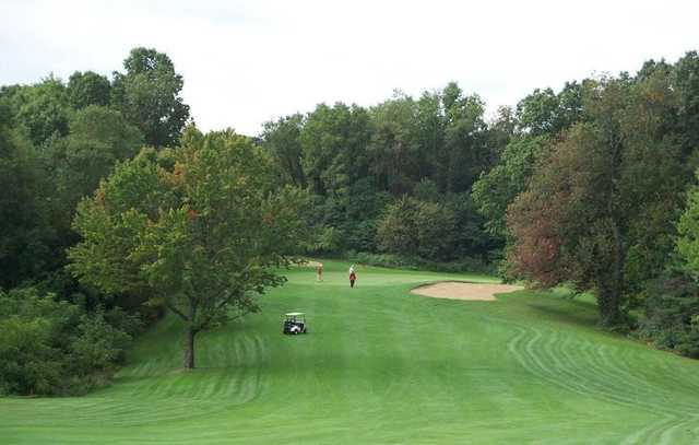 View of a green and fairway at Lake Doster Golf Club