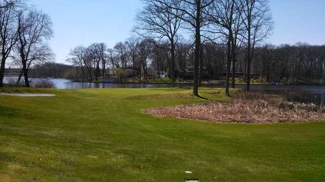 A view of a hole with water in background at Turkeyfoot Lake Golf Links