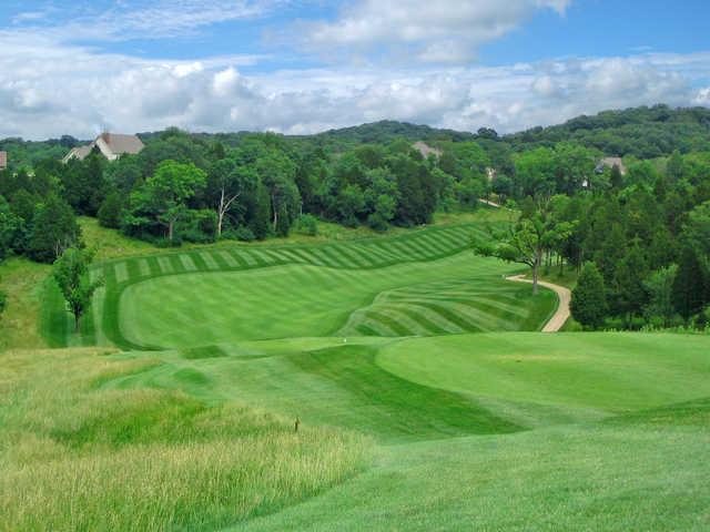 View of a green and fairway at Pevely Farms Golf Club