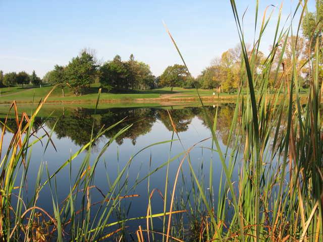 View of a green over water at Greenhaven Golf Course