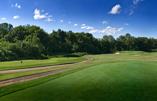 View of a fairway and green at Ledges Golf Club