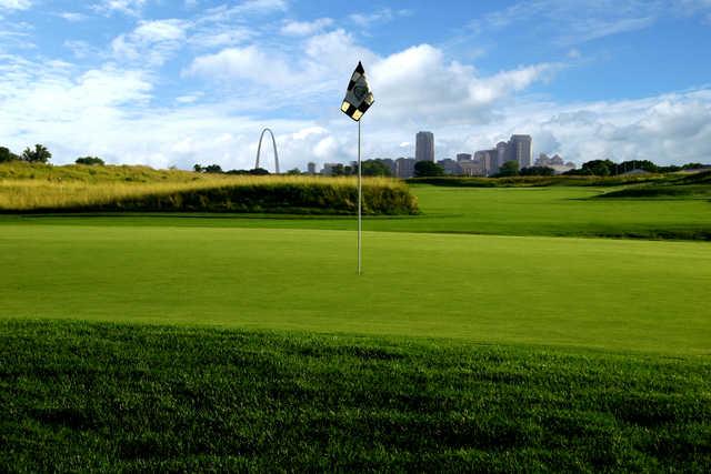 View of a green with St. Lois skyline in the background
