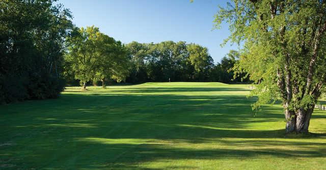 View of a green from a fairway at Coachman's Golf Resort.