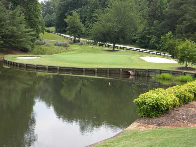 View of the signature hole - number 6 - at Village Greens Golf & Country Club 