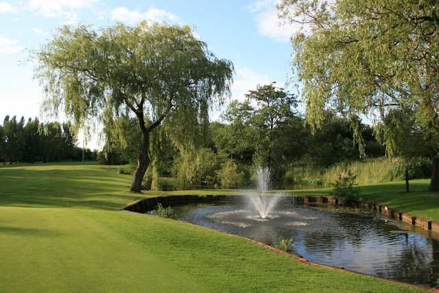 View of the pond to the left of the 4th green at Denton Golf Club