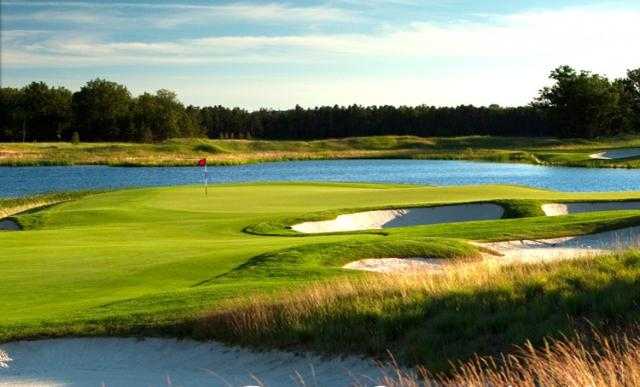 A view of a bunkered green at Forest Dunes Golf Club