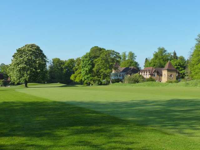 A view of the golf course and clubhouse at Badgemore Park
